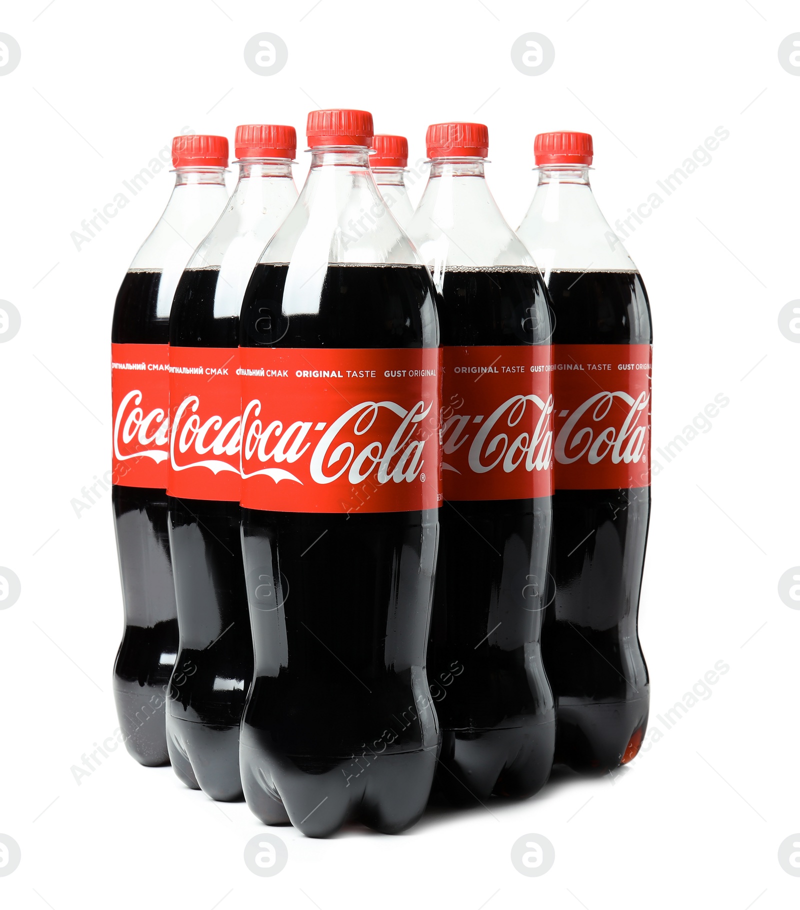 Photo of MYKOLAIV, UKRAINE - NOVEMBER 15, 2018: Bottles of Coca Cola on white background