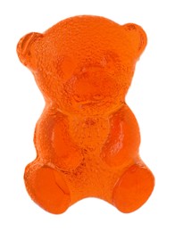 Photo of Delicious orange gummy bear candy isolated on white