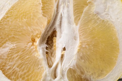 Photo of Closeup view of fresh pomelo fruit as background