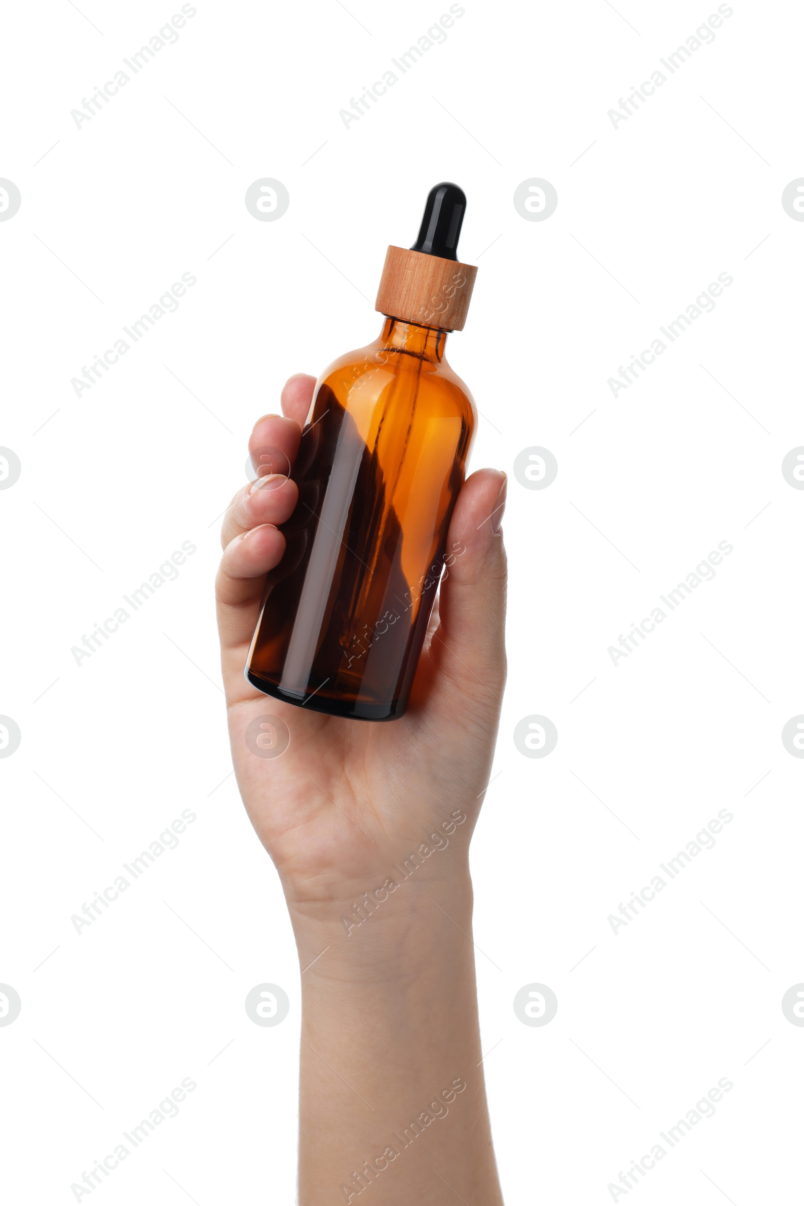 Photo of Woman holding glass bottle with dropper isolated on white, closeup