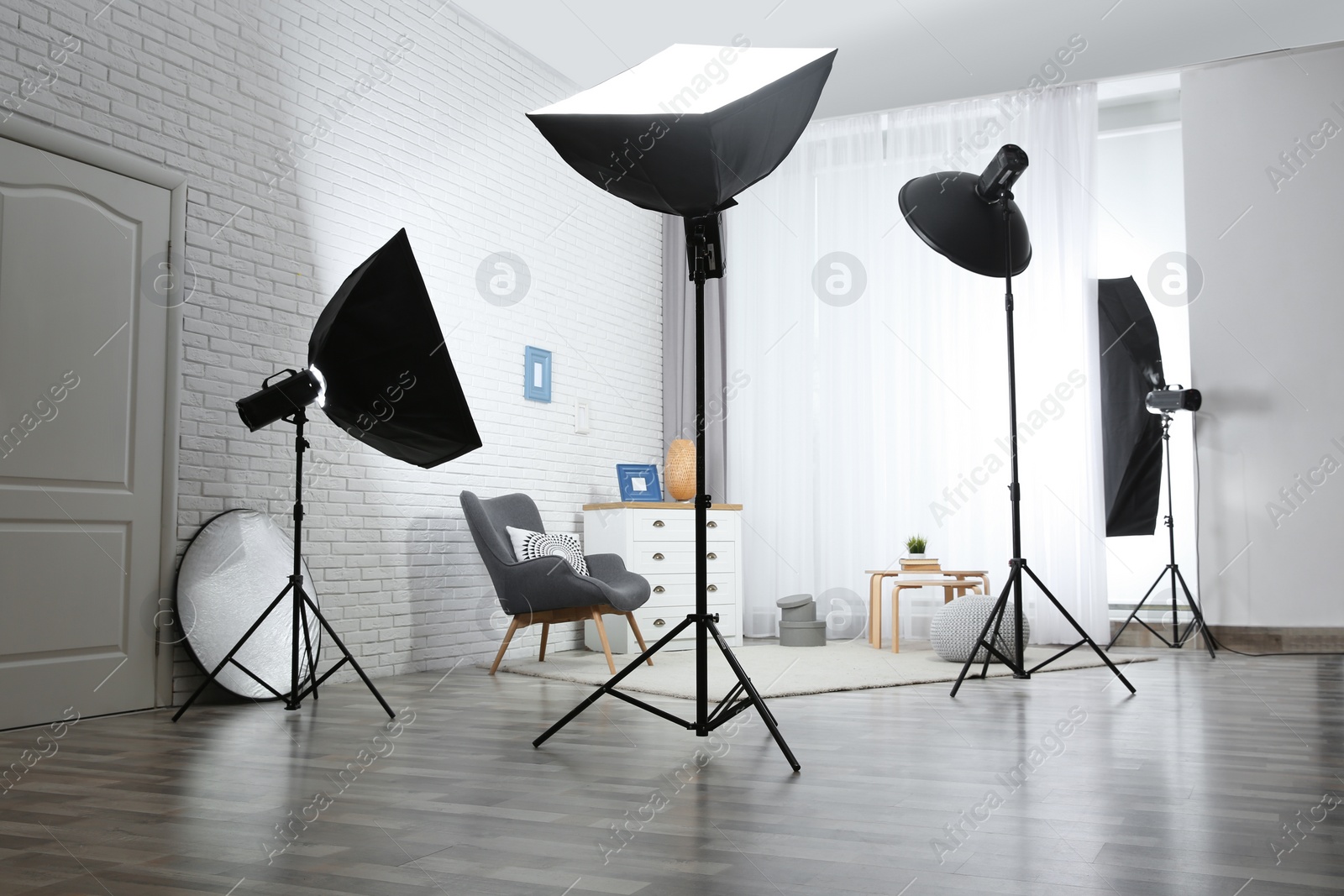 Photo of Example of living room interior design and professional equipment in photo studio