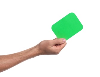 Photo of Man holding green card on white background, closeup of hand