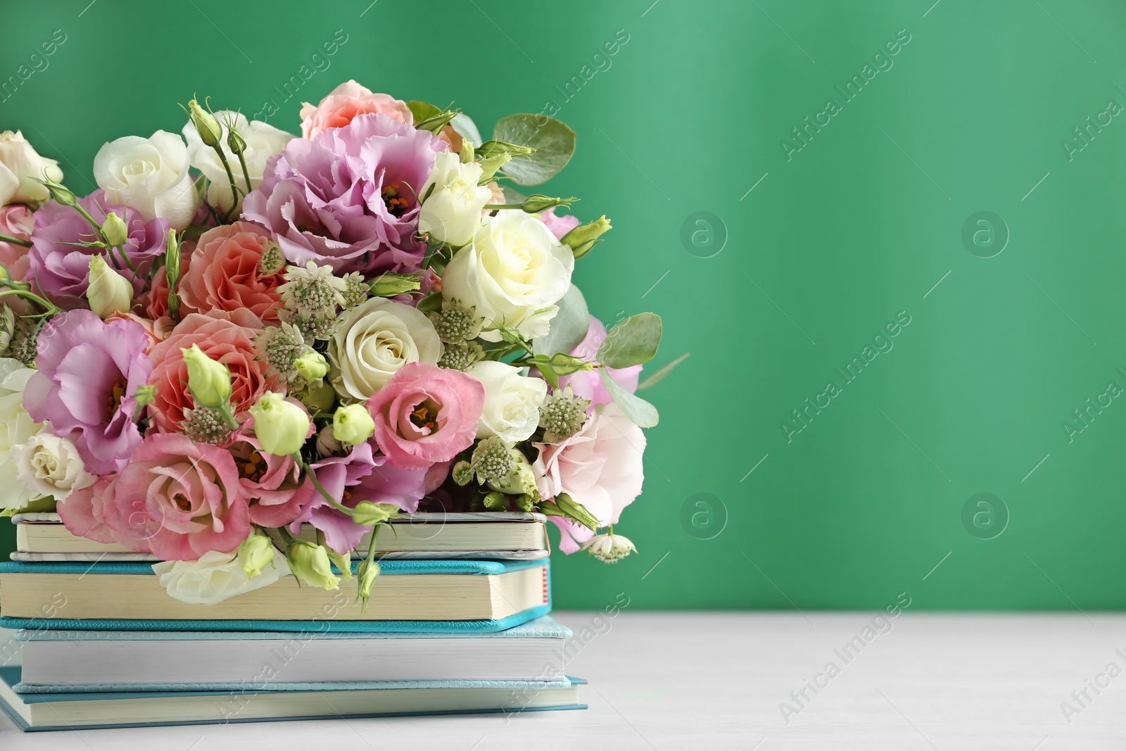 Photo of Composition with flowers for Teacher's day on white table