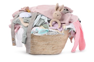 Photo of Laundry basket with baby clothes and soft toy isolated on white