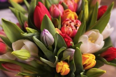 Photo of Beautiful bouquet of colorful tulip flowers, closeup