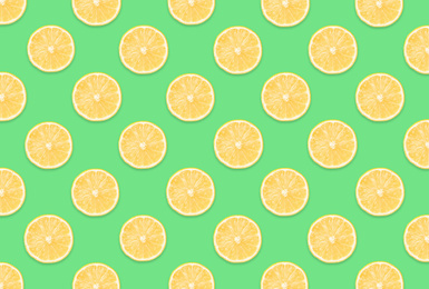Image of Pattern of lemon slices on light green background