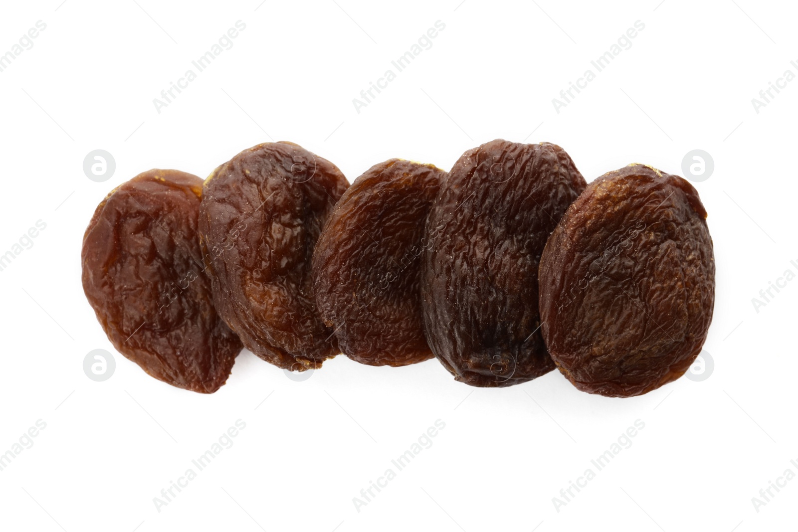 Photo of Tasty dried apricots on white background, top view