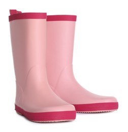 Photo of Modern pink rubber boots isolated on white