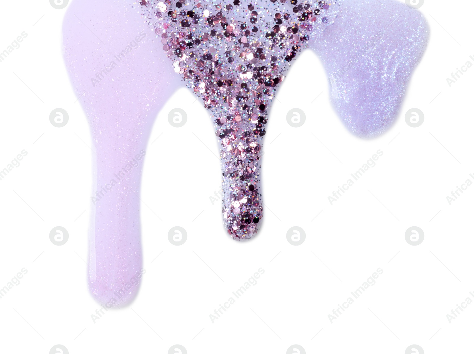 Photo of Different color nail polishes flowing on white background