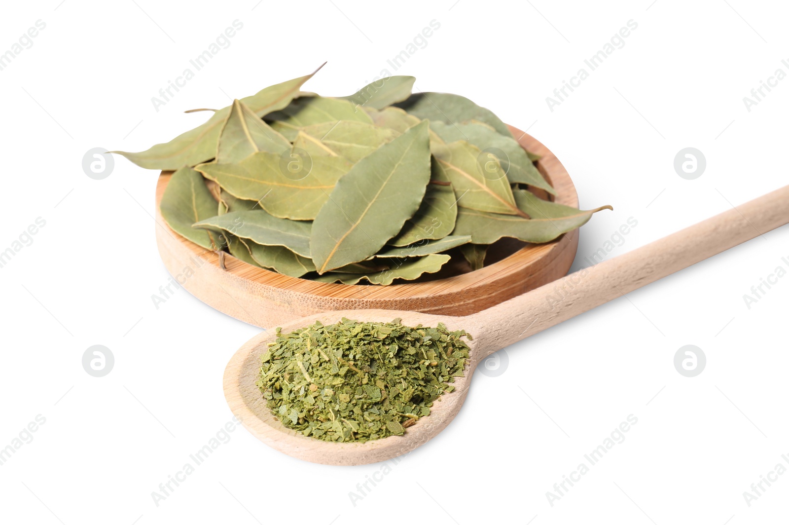 Photo of Whole and ground aromatic bay leaves on white background