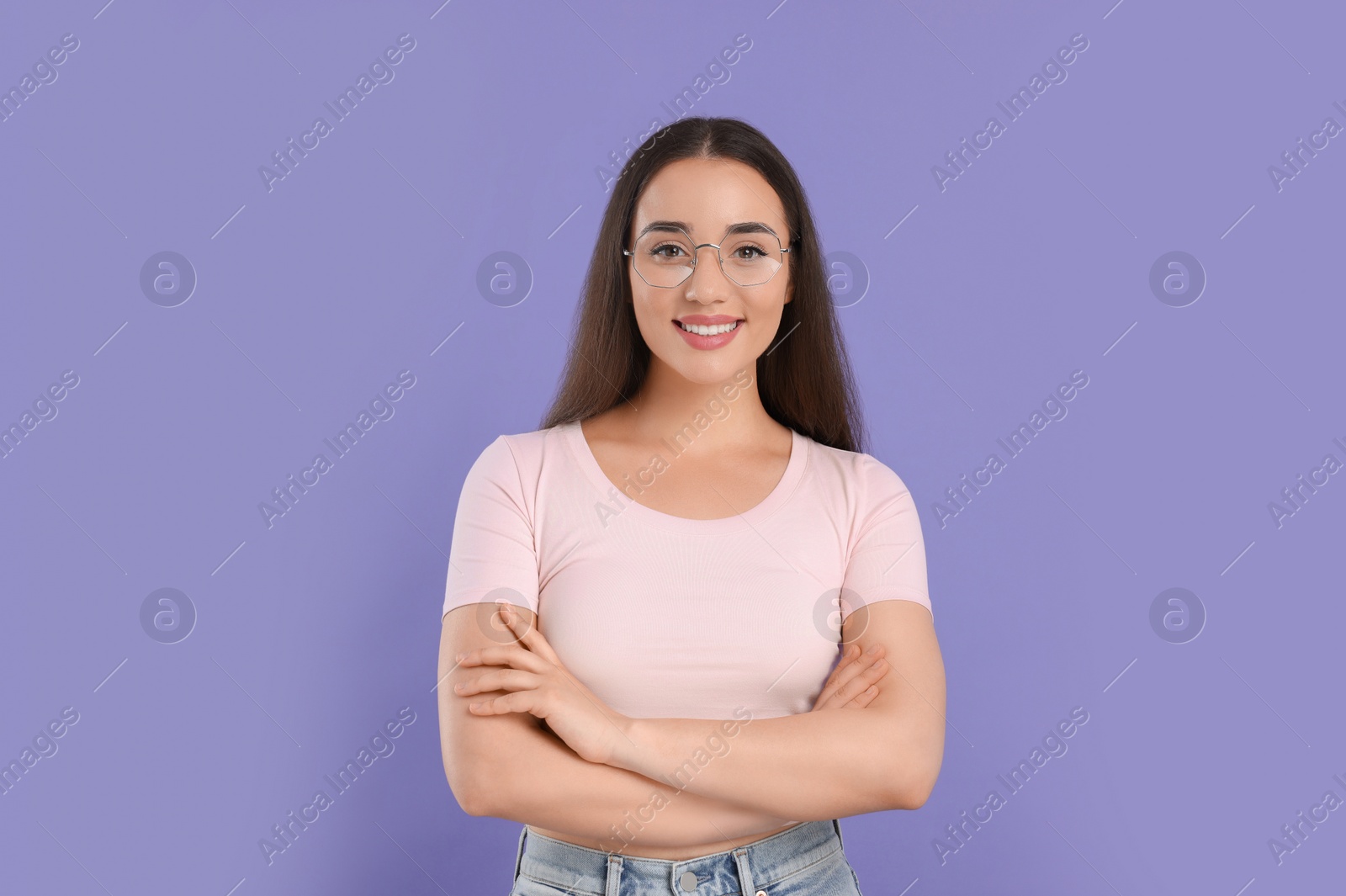 Photo of Beautiful woman wearing glasses on violet background