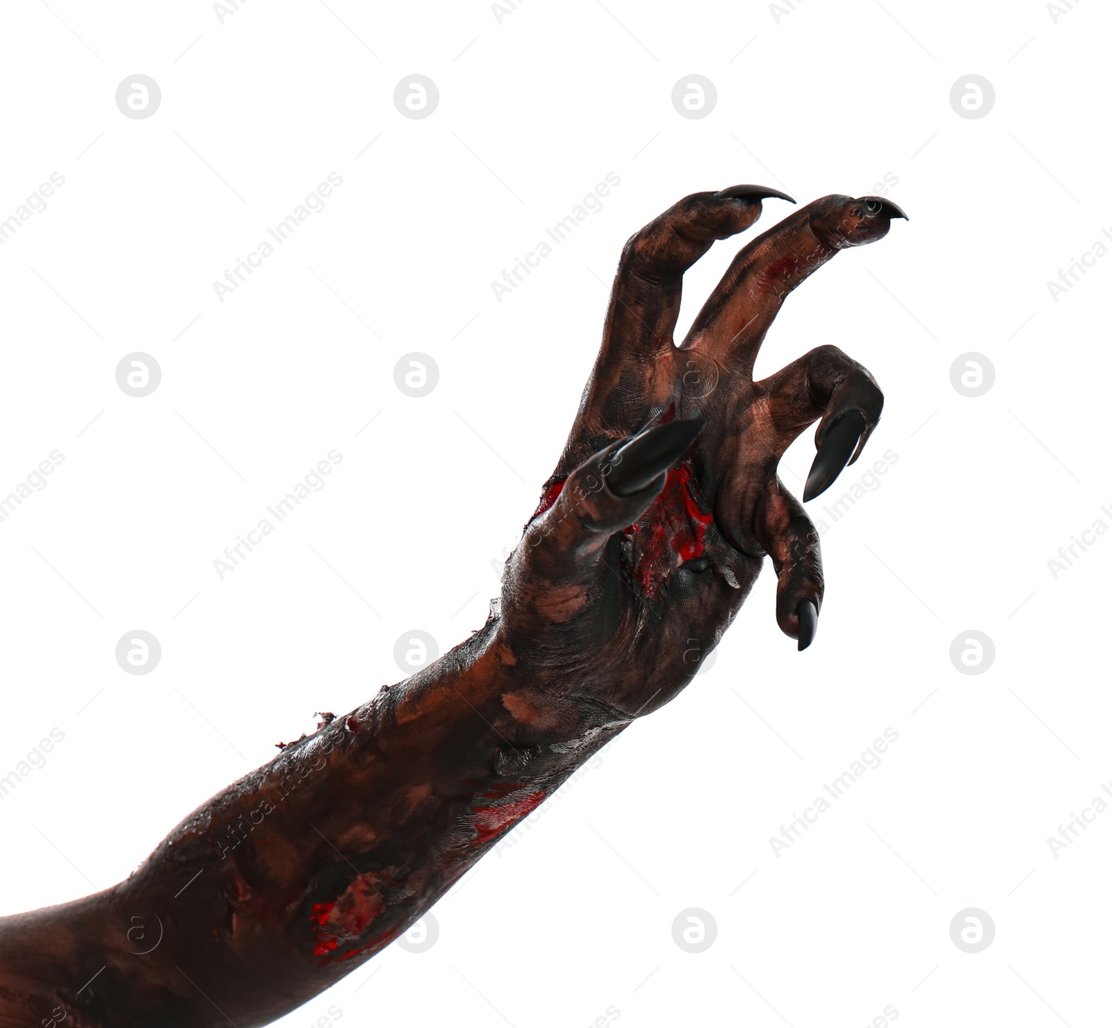 Photo of Scary monster on white background, closeup of hand. Halloween character