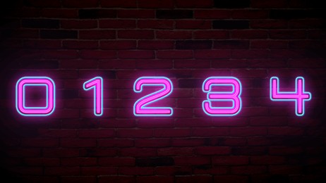 Image of Glowing neon number (0, 1, 2, 3, 4) signs on brick wall