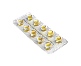 Pills in blister pack on white background