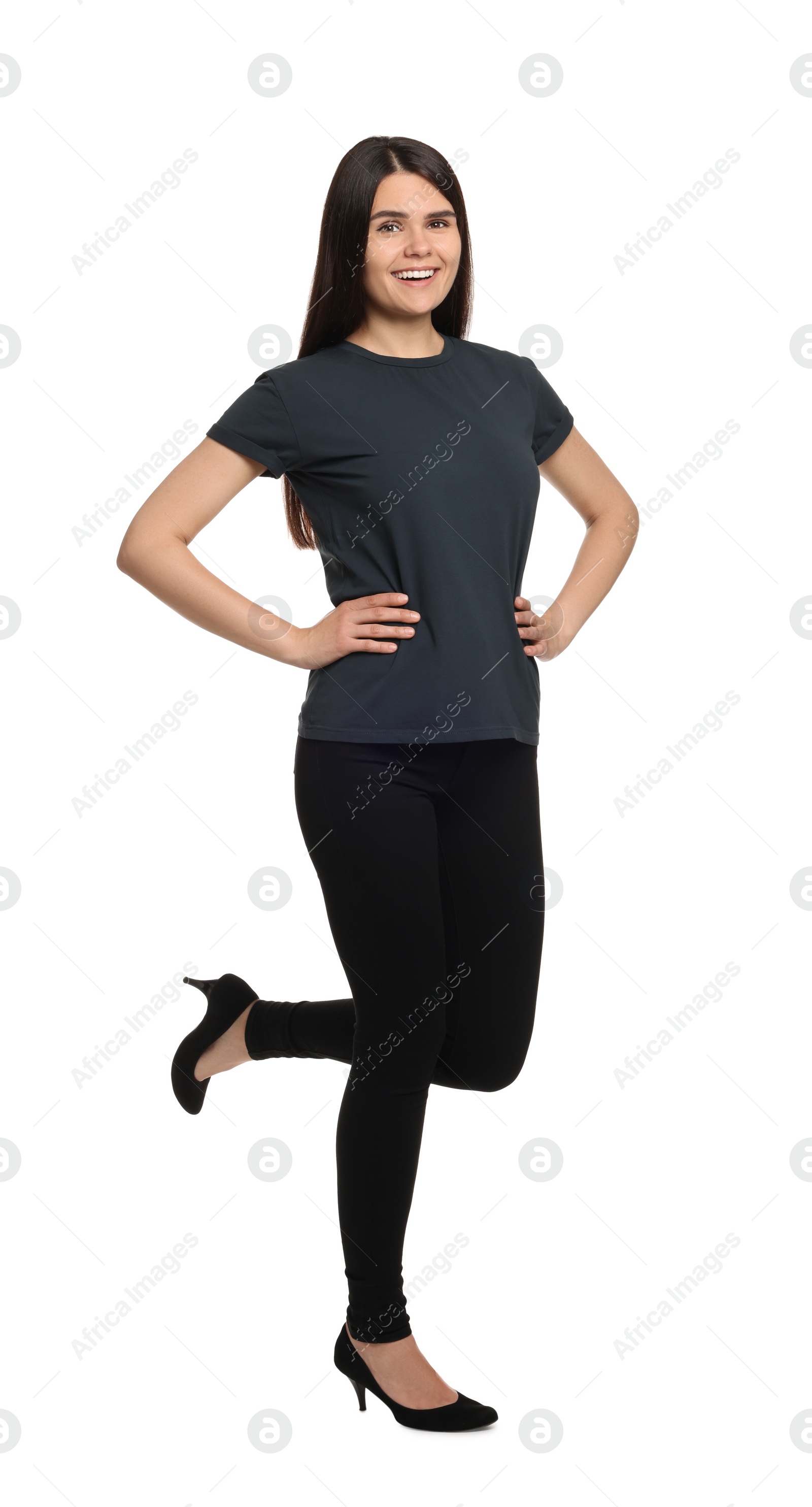 Photo of Woman wearing stylish black jeans and high heels shoes on white background