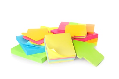 Photo of Pile of different colorful sticky notes on white background. School stationery