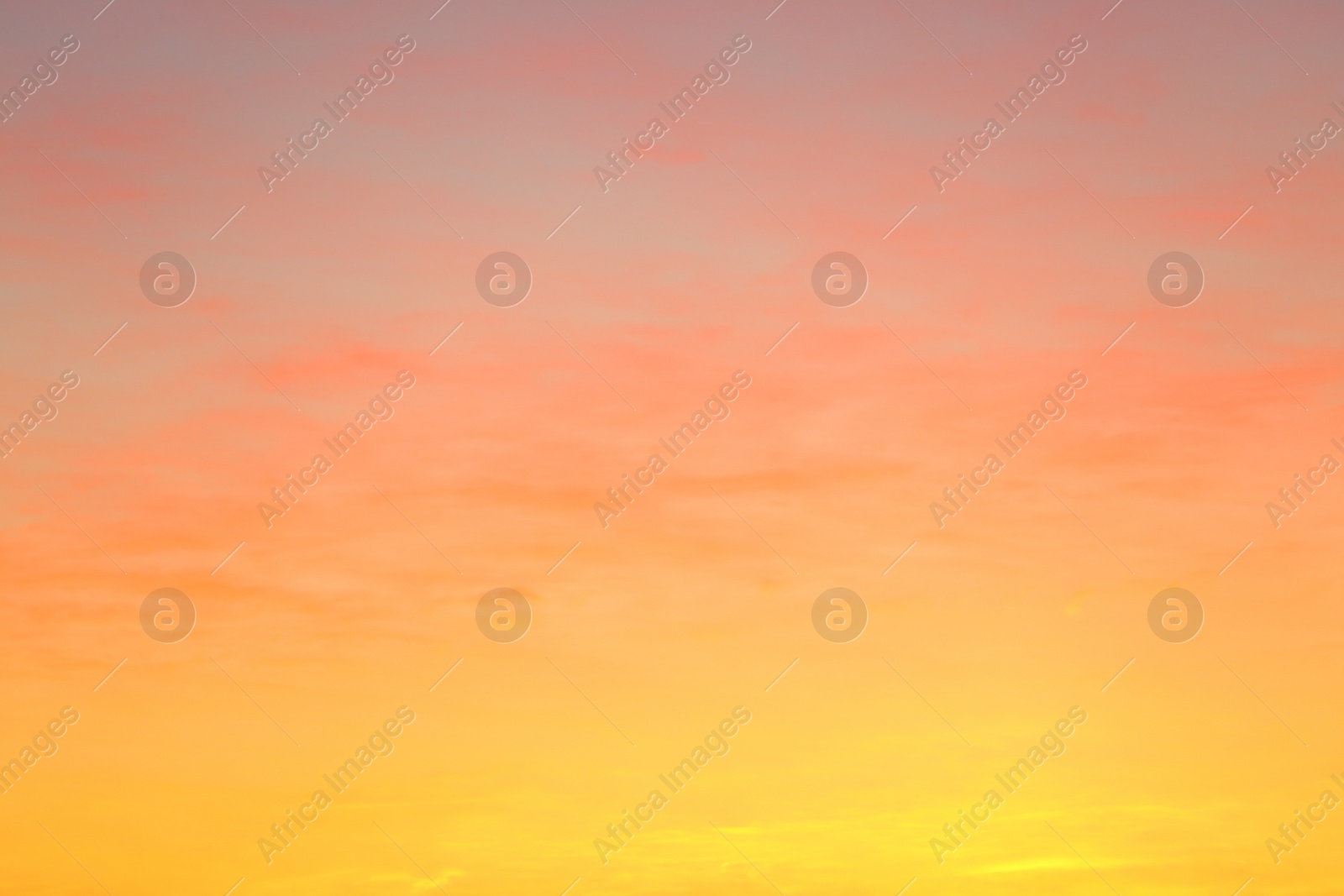 Photo of Picturesque view of beautiful sky lit by setting sun