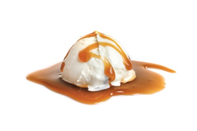 Tasty ice cream ball with caramel sauce on white background