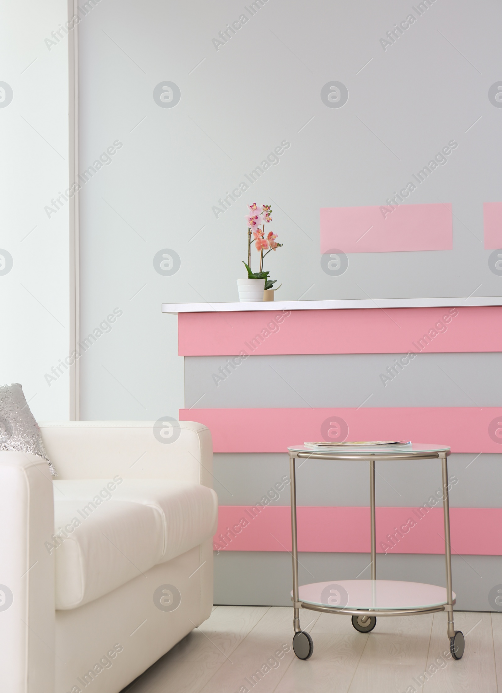 Photo of Reception desk in beauty salon. Stylish interior