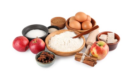 Photo of Yeast cake, flour and different ingredients on white background. Making pie