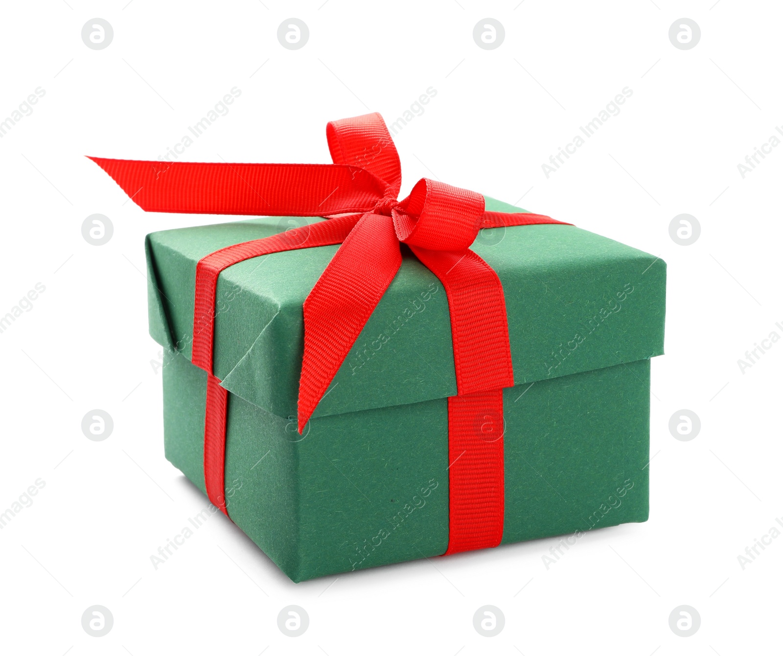 Photo of Christmas gift box decorated with red bow isolated on white