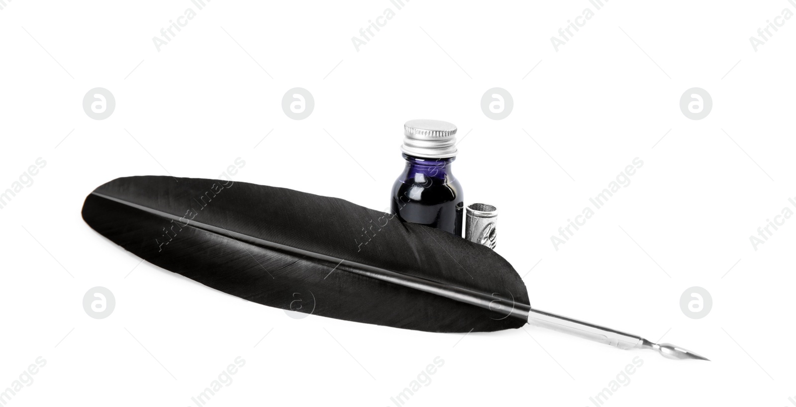 Photo of Feather pen and bottle of ink on white background