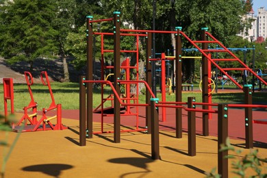 Photo of Empty outdoor gym with exercise equipment in park