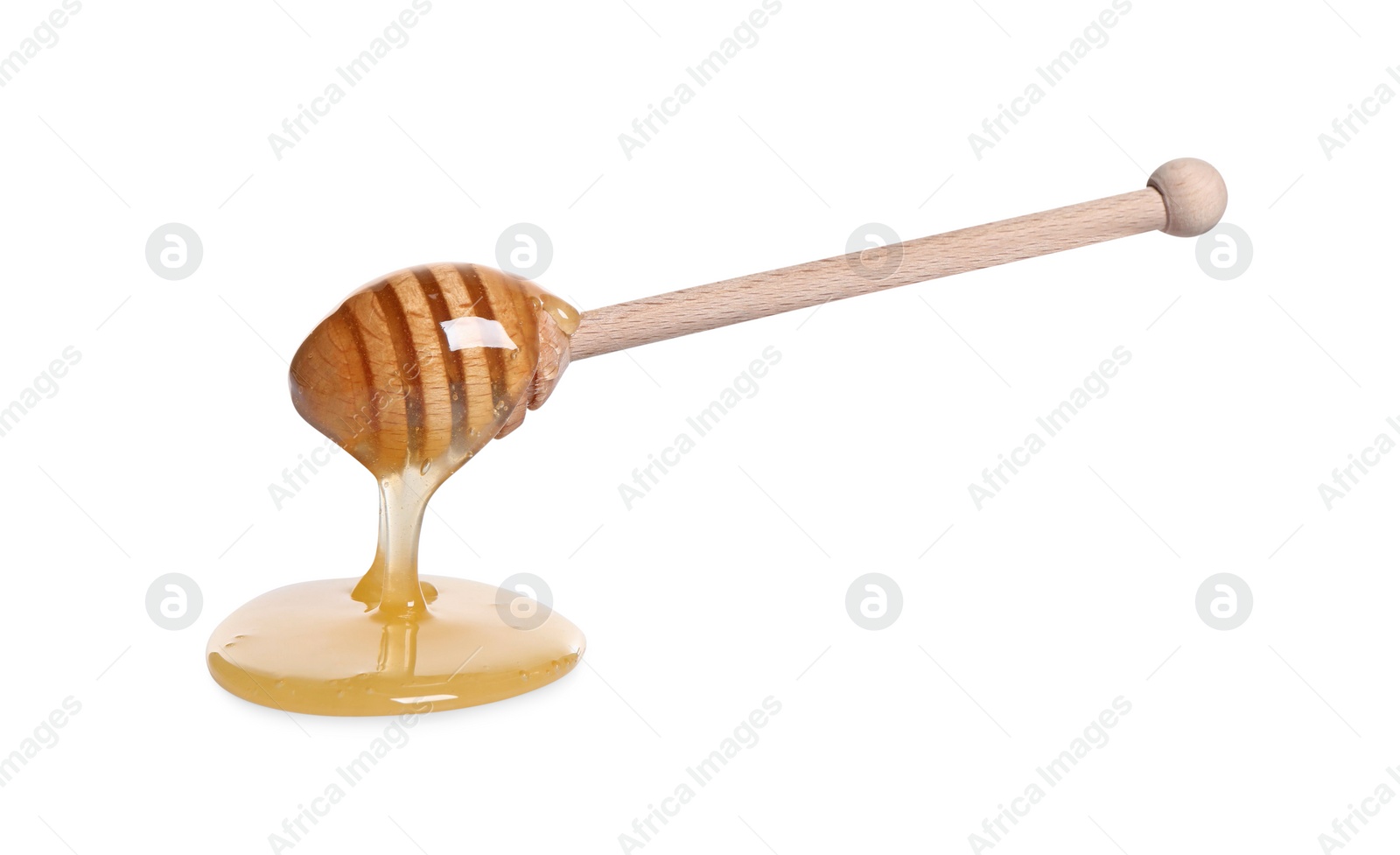 Photo of Natural honey dripping from dipper on white background