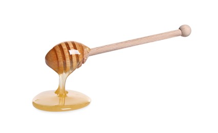 Photo of Natural honey dripping from dipper on white background