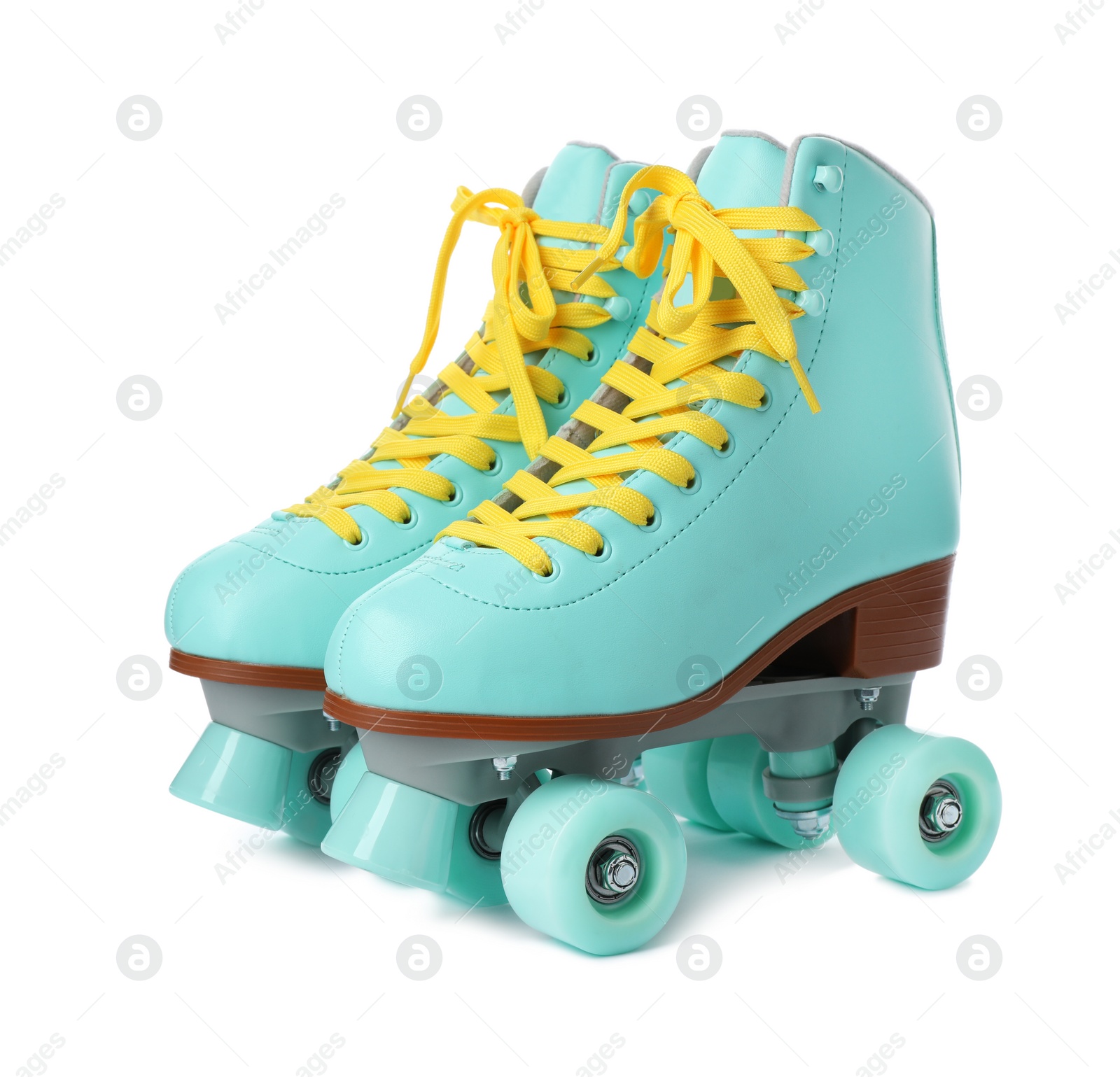 Photo of Pair of stylish quad roller skates on white background