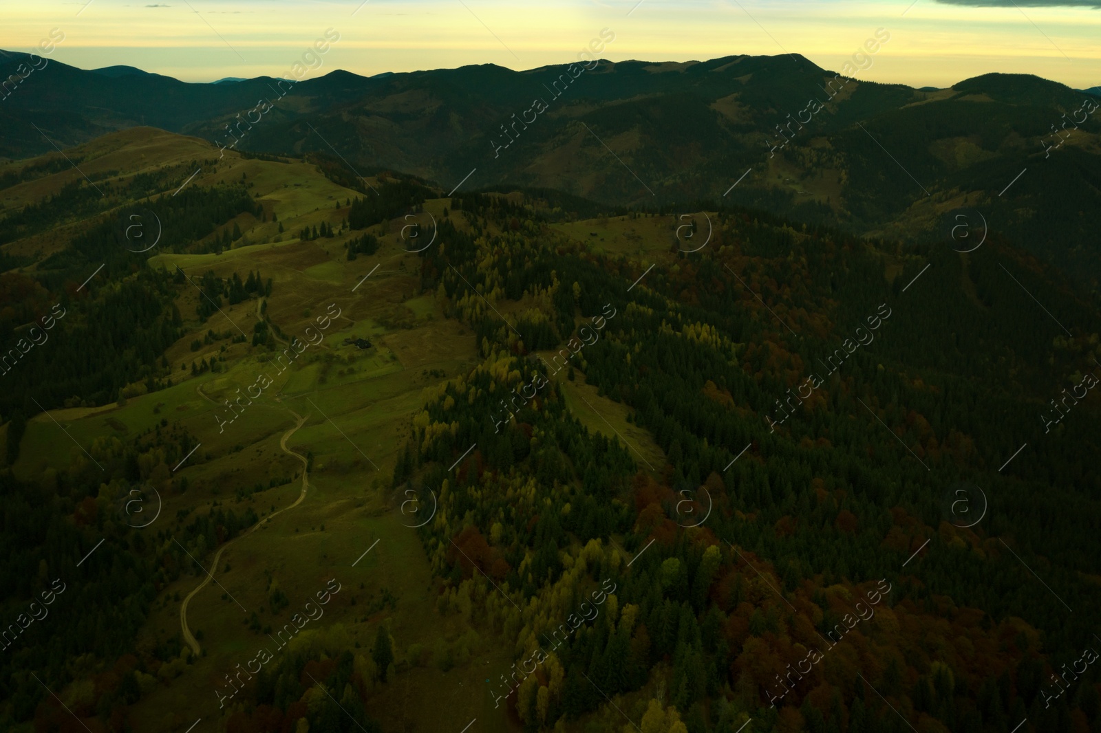 Image of Aerial view of beautiful mountain landscape on cloudy day