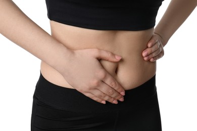 Photo of Woman suffering from pain in lower right abdomen on white background, closeup. Acute appendicitis