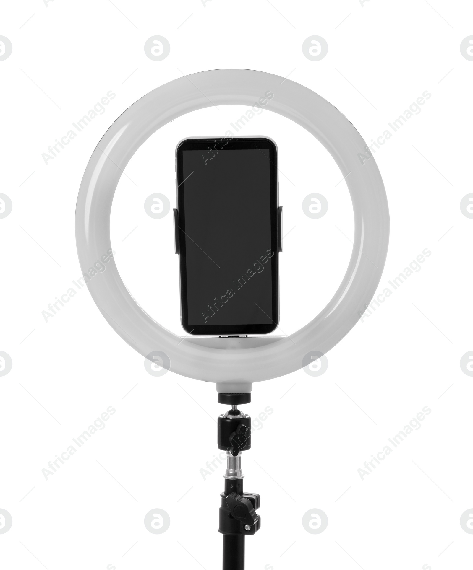 Photo of Tripod with ring light and smartphone isolated on white