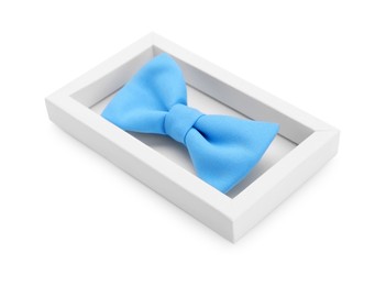 Stylish light blue bow tie on white background