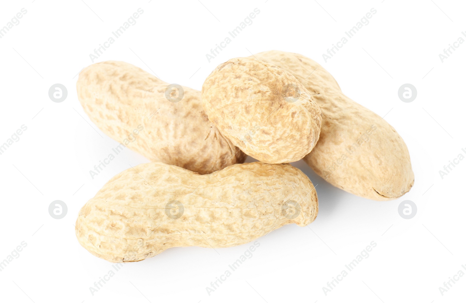 Photo of Pile of fresh unpeeled peanuts isolated on white