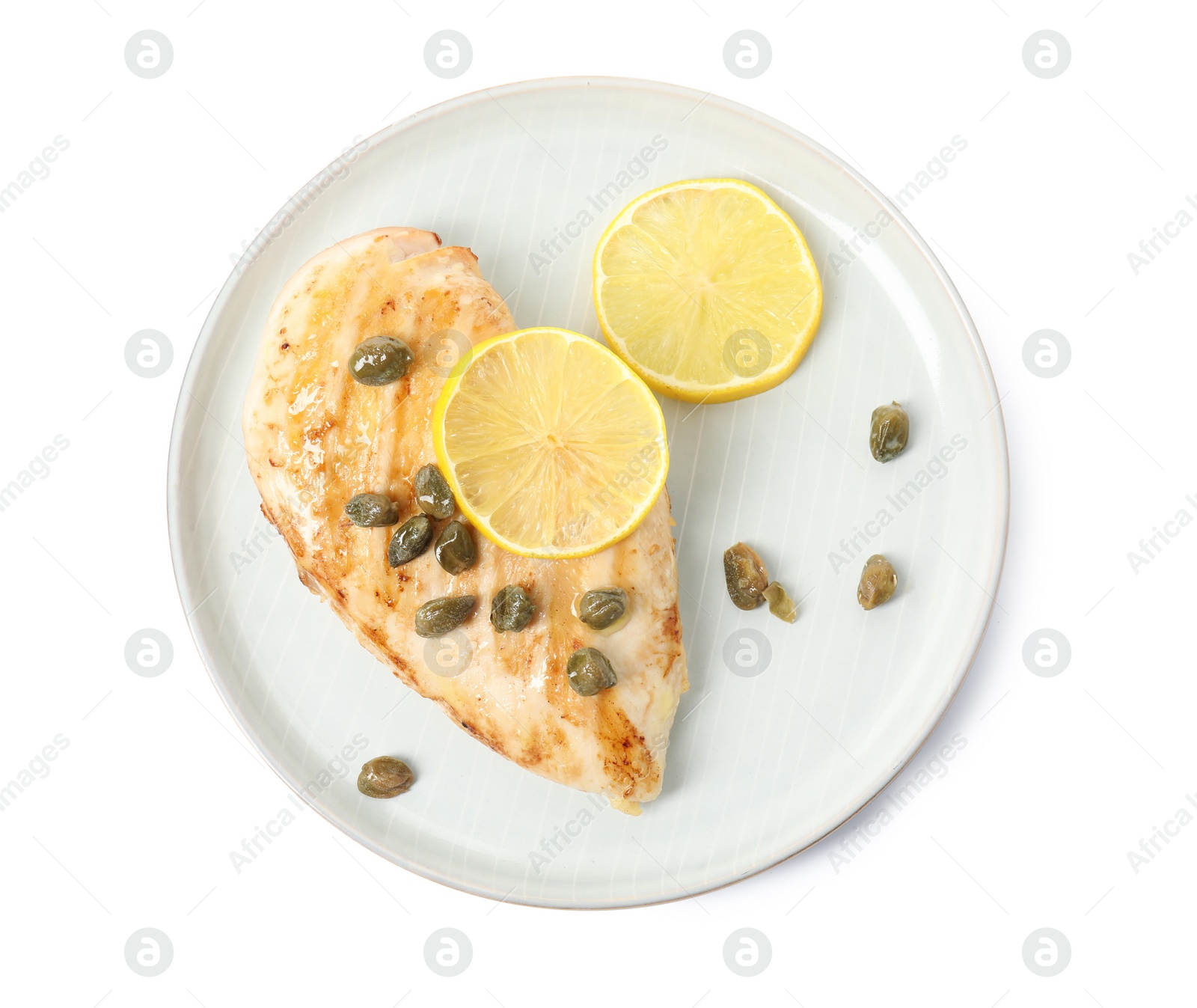 Photo of Delicious chicken fillet with capers and lemon isolated on white, top view