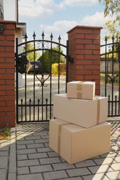 Stack of parcels delivered near front gates