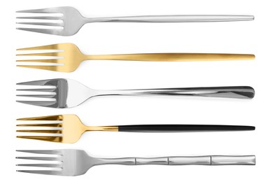 Stylish golden and silver forks isolated on white, set