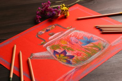 Photo of Colorful pastel pencils, flowers and beautiful painting of kettle on wooden table