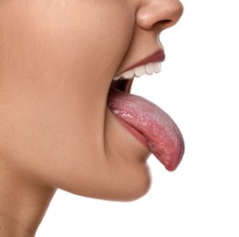 Photo of Happy young woman showing her tongue on white background, closeup