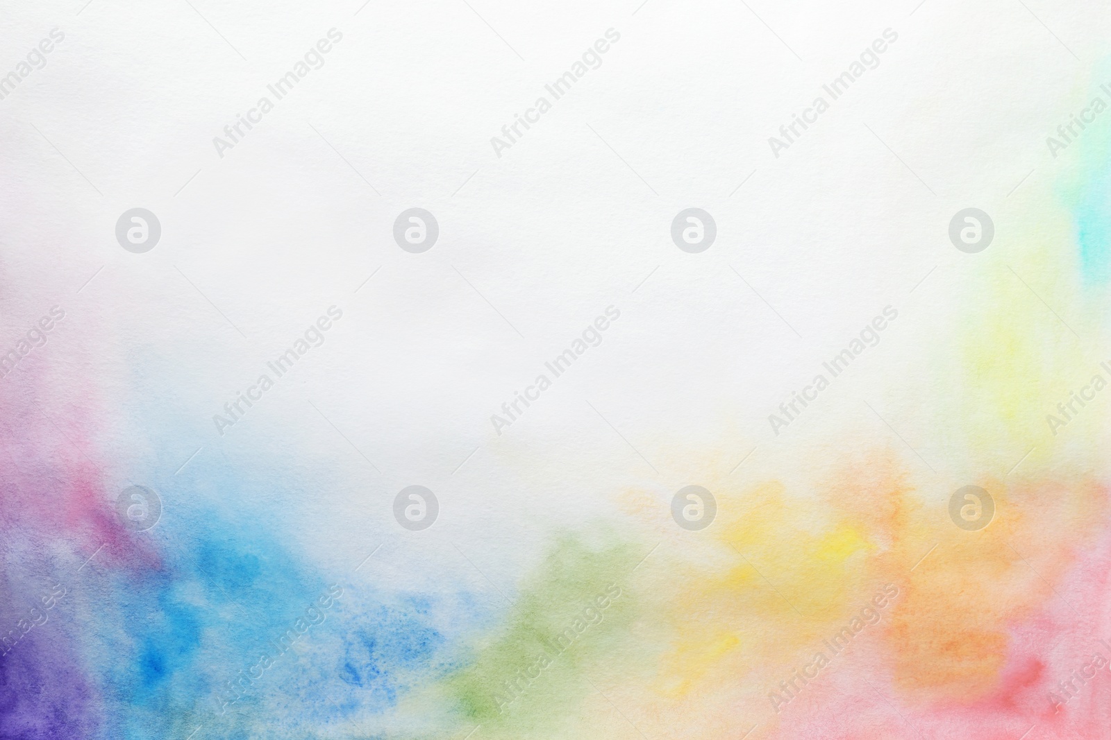 Photo of Colorful paints on white paper. Abstract background