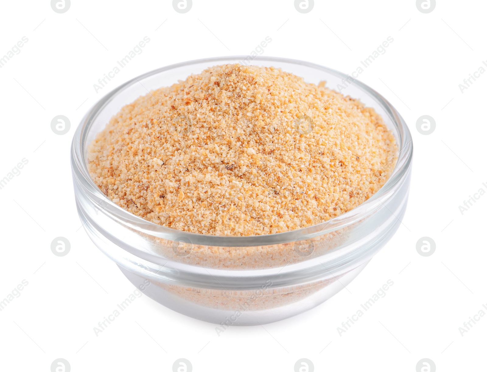 Photo of Fresh bread crumbs in glass bowl isolated on white