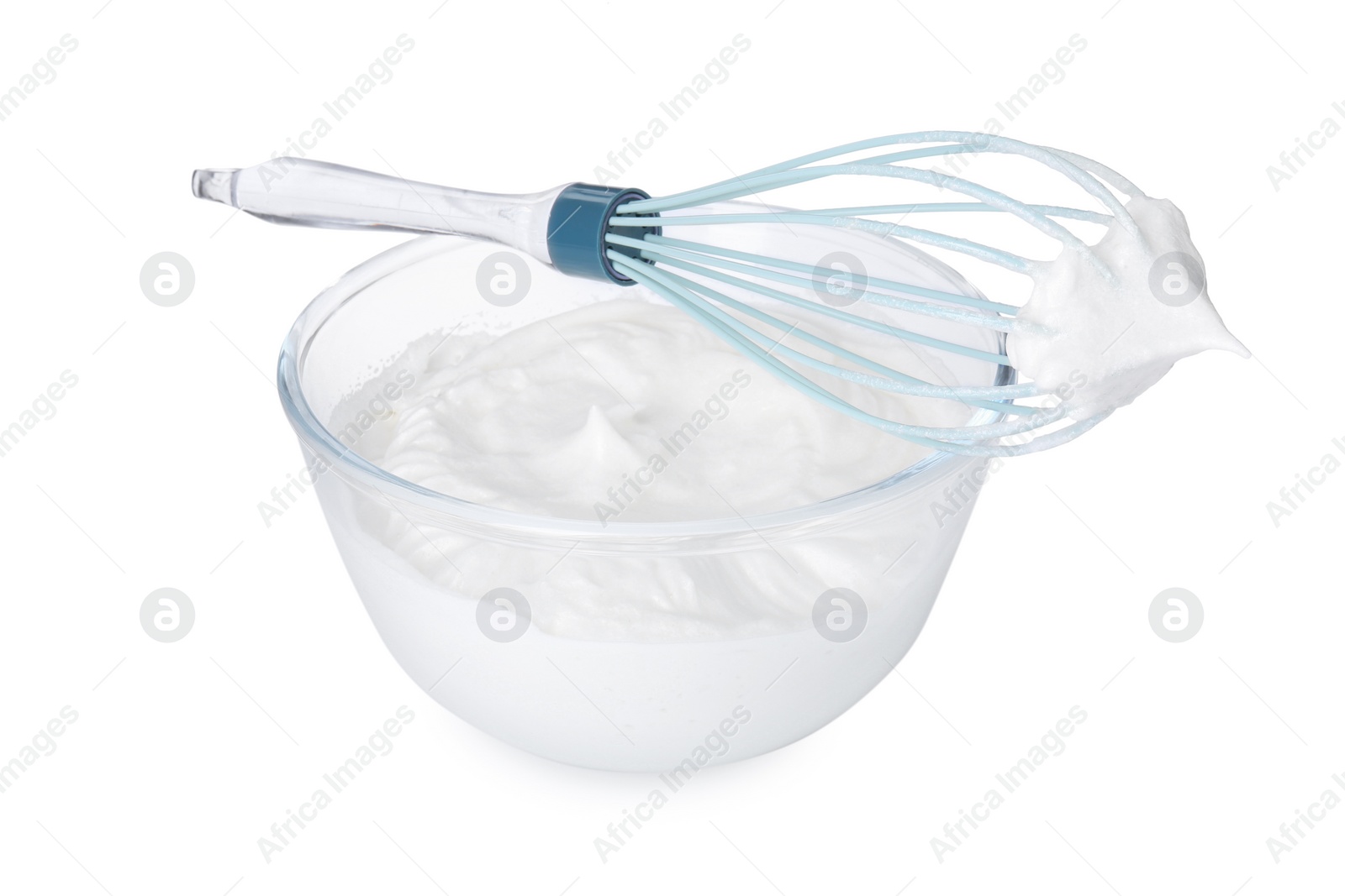 Photo of Bowl with whipped cream and whisk isolated on white