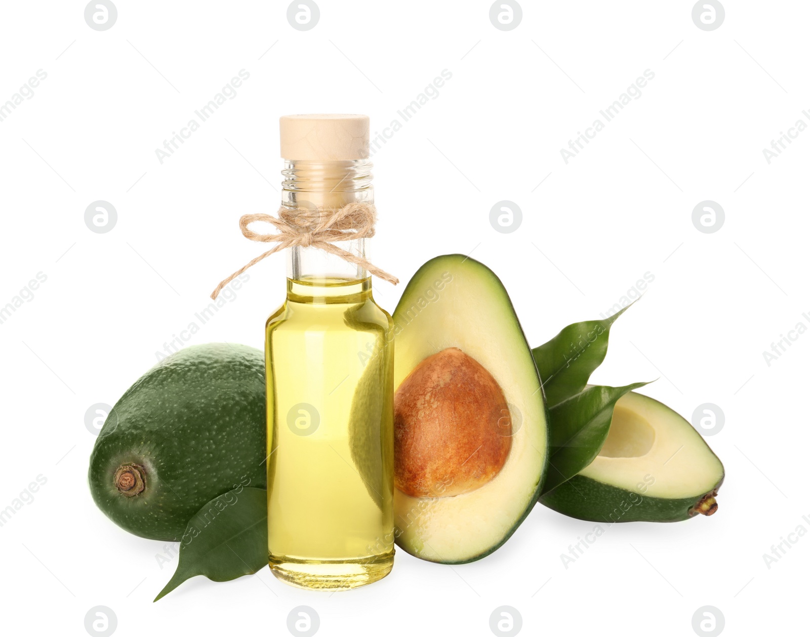 Photo of Cooking oil and fresh avocados isolated on white