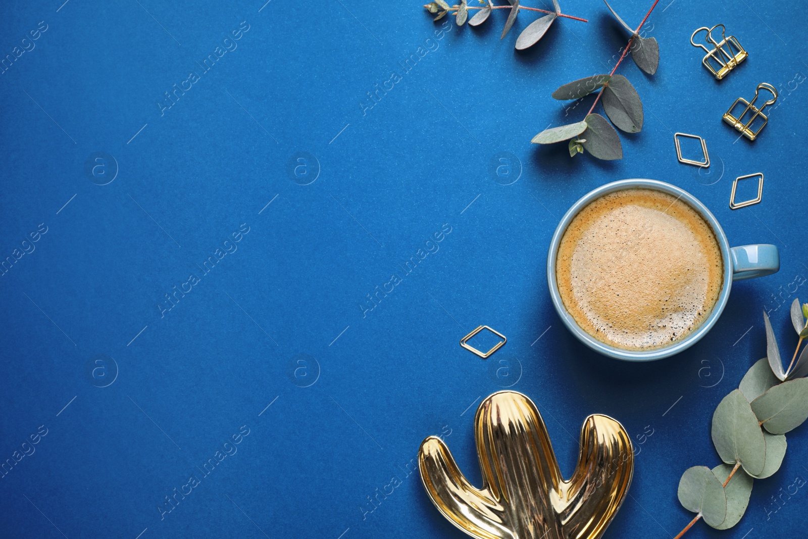 Photo of Flat lay composition inspired by color of the year 2020  (Classic blue). Space for text