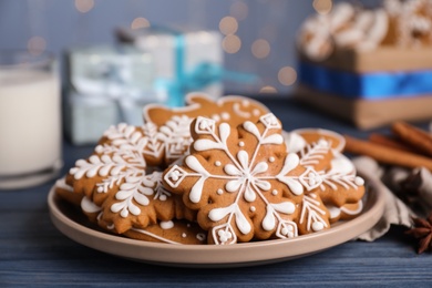 Delicious Christmas cookies on blue wooden table