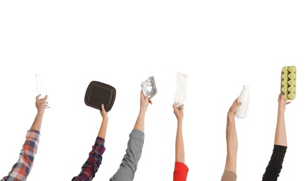 Photo of People holding different garbage on white background. Waste recycling concept