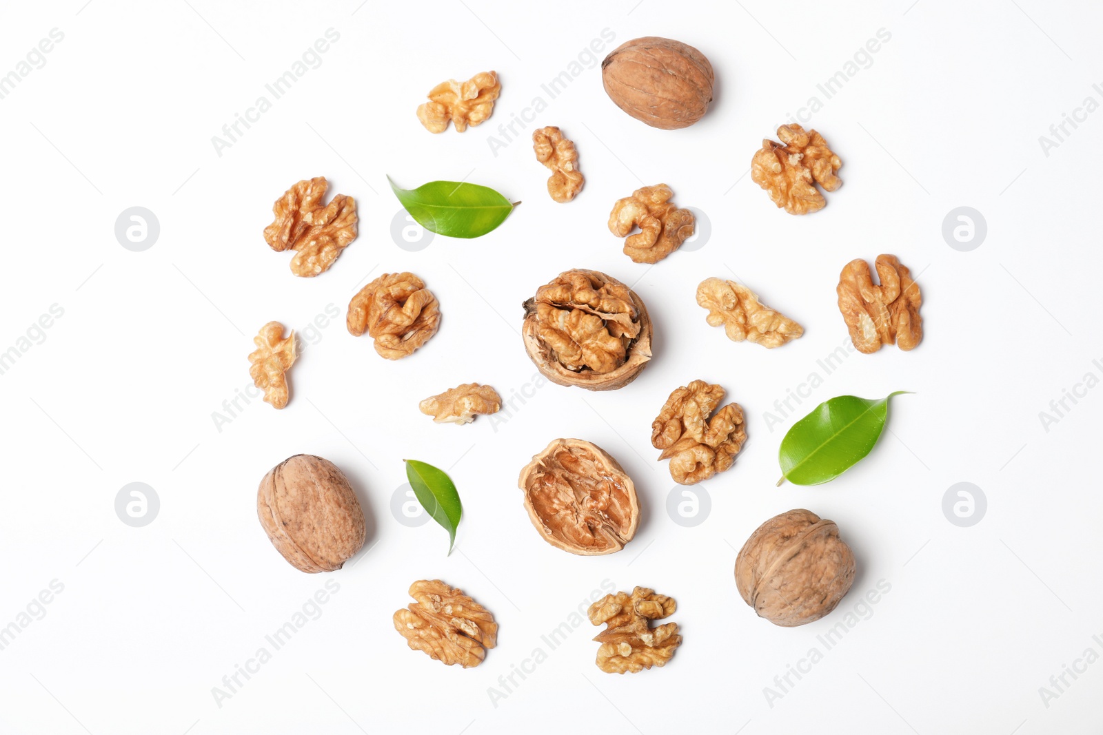 Photo of Composition with walnuts on white background, top view