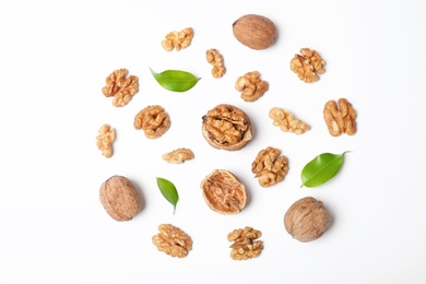 Photo of Composition with walnuts on white background, top view