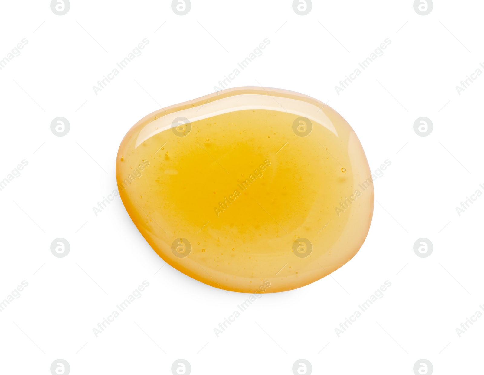 Photo of Drop of tasty natural honey isolated on white, top view